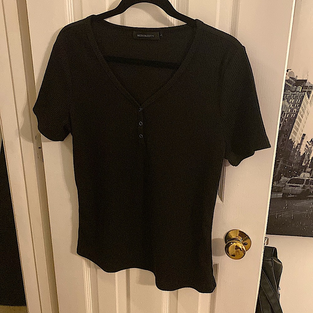 Black top with buttons.